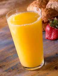 Suc de taronja en un got.